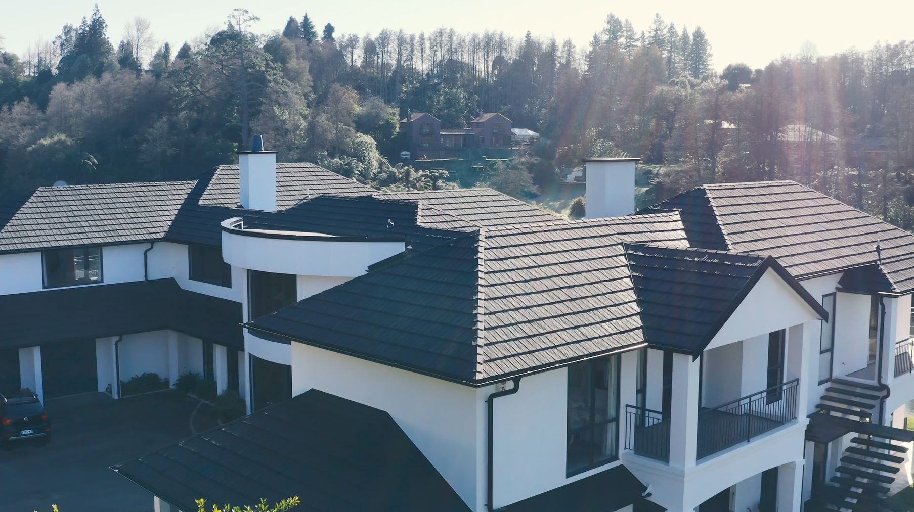 Substantial home re-roofed with our Concealed Fastening Shake product in Charcoal Blend.