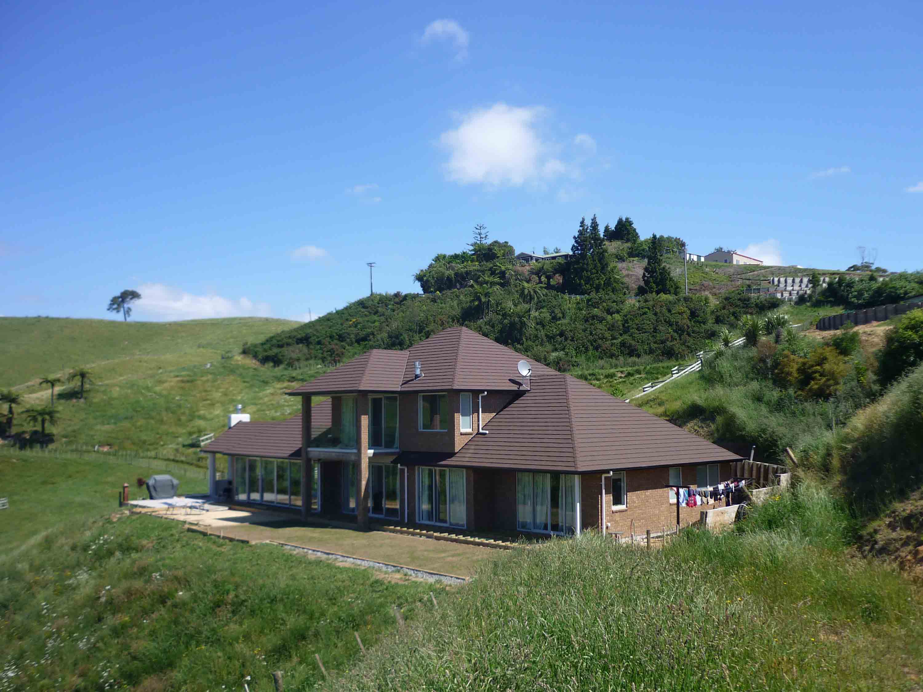 Countryside home roofed in CF Slate steel roofing.